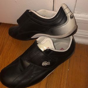 Women’s black Lacoste shoes